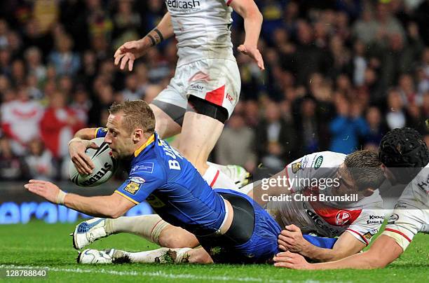 Rob Burrow of Leeds Rhinos scores the opening try during the Engage Super League Grand Final match between St Helens and Leeds Rhinos at Old Trafford...