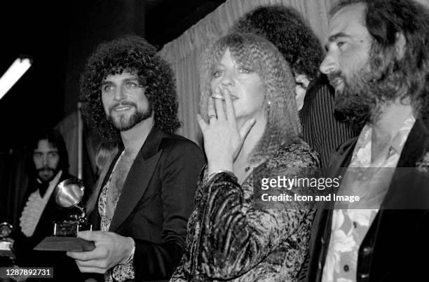 British-American rock band Fleetwood Mac's "Rumours" wins the Album of the Year award at the 20th Grammy Awards. From left, lead guitarist Lindsey...