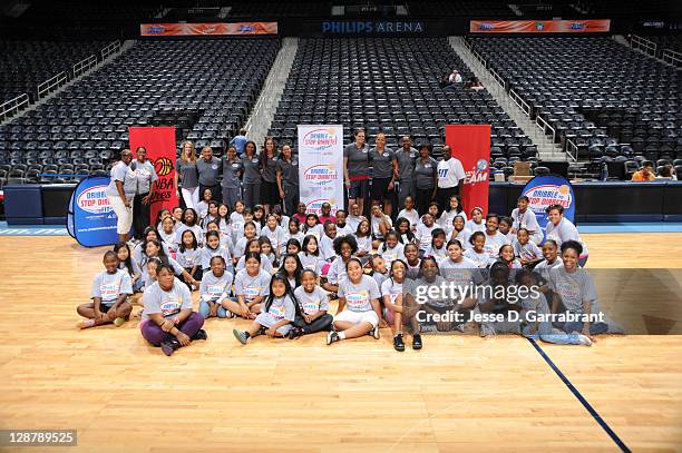 Group shot during the Dribble to Stop Diabetes Fit Clinic at Philips Arena on October 8, 2011 in Atlanta, Georgia. NOTE TO USER: User expressly...