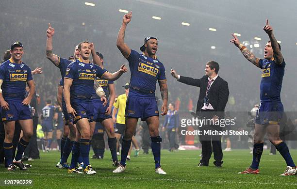 The Leeds Rhinos players celebrate victory at the end of the Engage Super League Grand Final match between St Helens and Leeds Rhinos at Old Trafford...