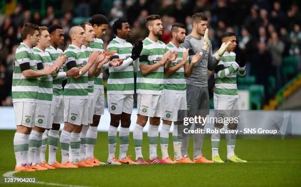 V MOTHERWELL.CELTIC PARK - GLASGOW.The Celtic players observe a minute's applause for former player Bobby Collins who passed away on Monday