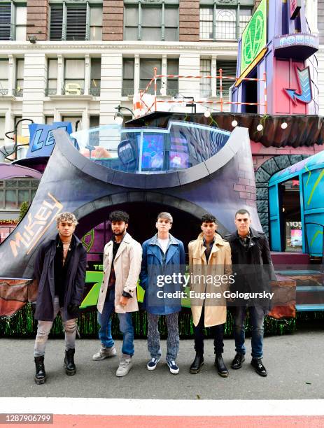 Zabdiel De Jesus, Erick Brian Colon, Christopher Velez, Joel Pimentel and Richard Camacho of CNCO pose in front of Teenage Mutant Ninja Turtles float...