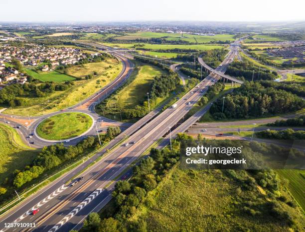 motorway interchanges - aerial view - motorway uk stock pictures, royalty-free photos & images