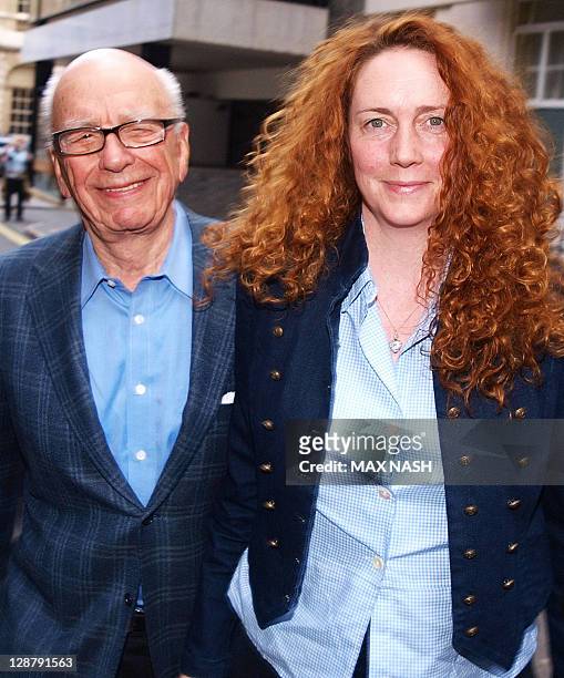 File picture taken on July 10 shows Rebekah Brooks former Chief Executive of News International and Rupert Murdoch Chairman of News Corporation in...