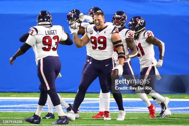 Watt of the Houston Texans celebrates a touchdown after intercepting a pass during the first half against the Detroit Lions at Ford Field on November...