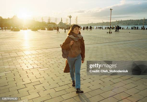 woman walking in istanbul - istanbul street stock pictures, royalty-free photos & images