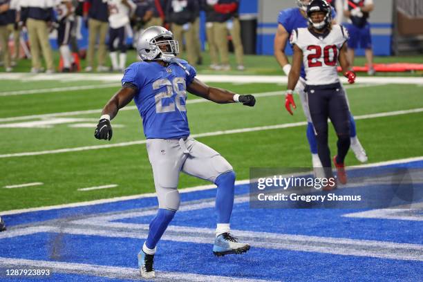 Adrian Peterson of the Detroit Lions celebrates a touchdown during the first half against the Houston Texans at Ford Field on November 26, 2020 in...