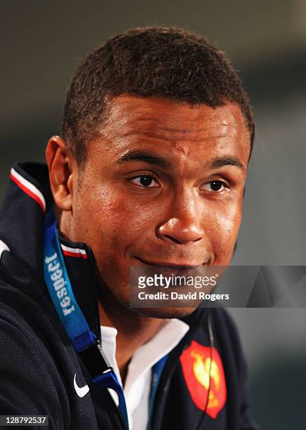 Thierry Dusautoir of France smiles in a press conference after quarter final two of the 2011 IRB Rugby World Cup between England and France at Eden...