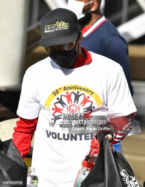 Lil Bankhead attends Hosea Helps Thanksgiving Dinner Drive Thru at Georgia World Congress Center on November 26, 2020 in Atlanta, Georgia. The annual...