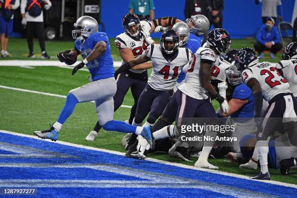 Adrian Peterson of the Detroit Lions celebrates a touchdown during the first half against the Houston Texans at Ford Field on November 26, 2020 in...