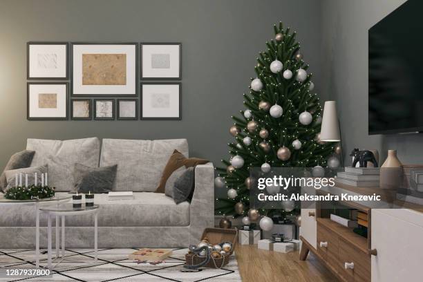 wohnzimmer mit weihnachtsdekoration - anrichte stock-fotos und bilder