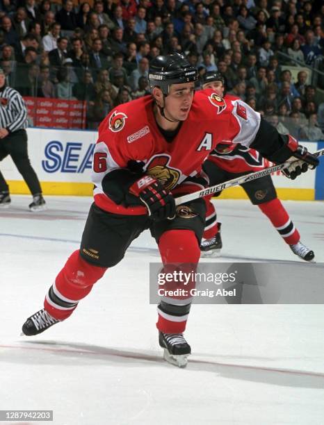 Wade Redden of the Ottawa Senators skates against the Toronto Maple Leafs during NHL game action on December 13, 1999 at Air Canada Centre in...