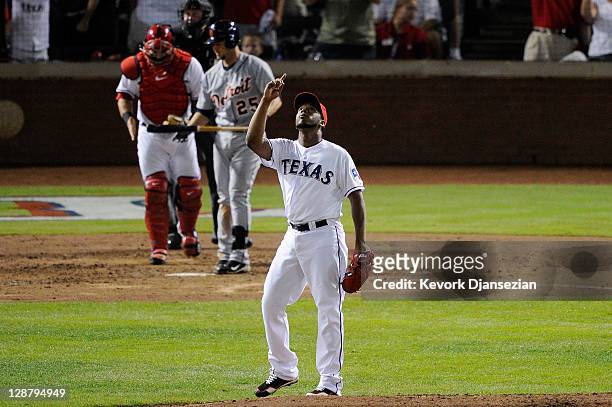 Neftali Feliz of the Texas Rangers celebrates after the final out of the Rangers the 3-2 win over the Detroit Tigers in Game One of the American...