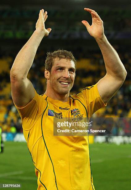 Lock Dan Vickerman of Australia celebrates following his team's victory during quarter final three of the 2011 IRB Rugby World Cup between South...