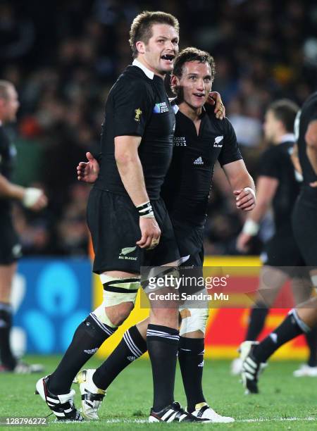 Richie McCaw and Aaron Cruden of the All Blacks celebrate the try scored by Kieran Read during quarter final four of the 2011 IRB Rugby World Cup...