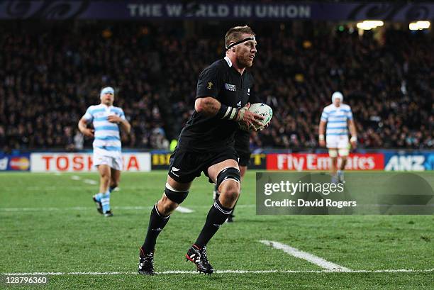 Brad Thorn of the All Blacks runs in his try during quarter final four of the 2011 IRB Rugby World Cup between New Zealand and Argentina at Eden Park...