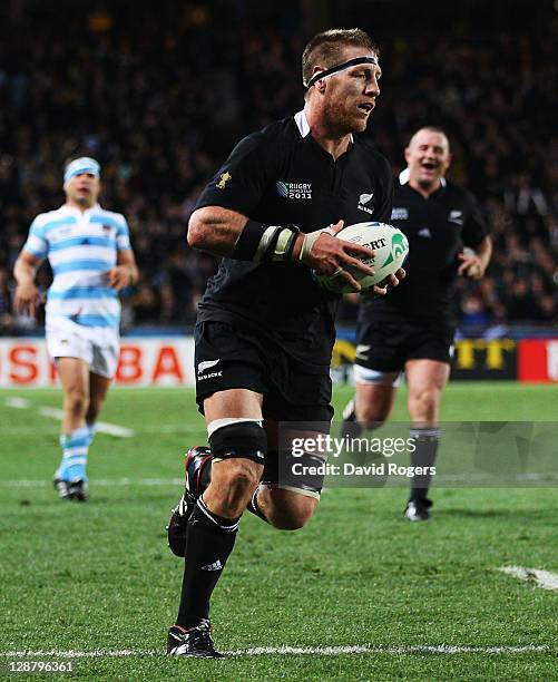 Brad Thorn of the All Blacks runs in his try during quarter final four of the 2011 IRB Rugby World Cup between New Zealand and Argentina at Eden Park...