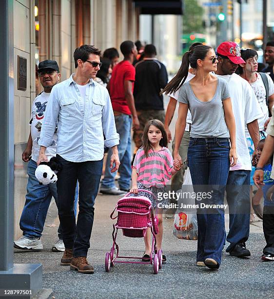 Tom Cruise, Suri Cruise and Katie Holmes seen on the streets of Pittsburgh on October 8, 2011 in Pittsburgh, Pennsylvania.