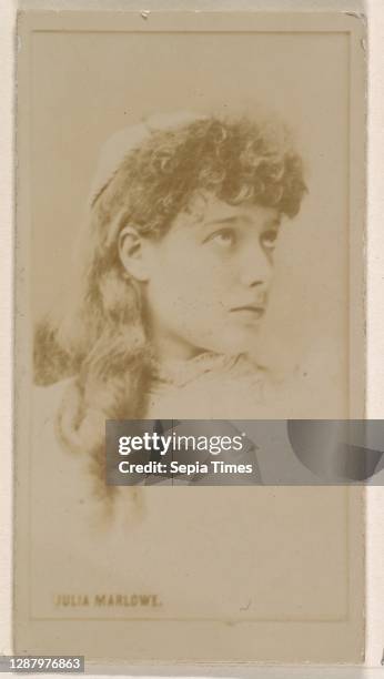Issued by Kinney Brothers Tobacco Company, Julia Marlow, from the Actresses series, issued by Kinney Brothers to promote Sweet Caporal Cigarettes...