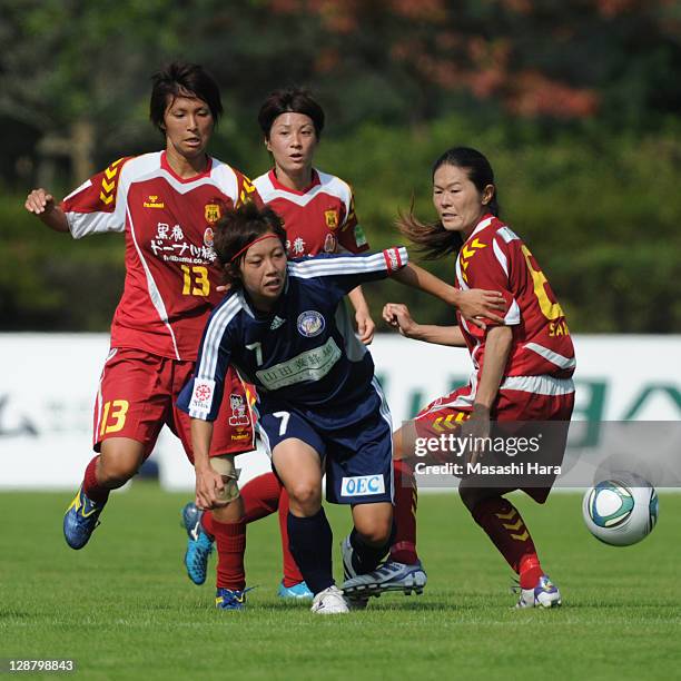 Manami Nakano of Okayama Yunogo Belle and INAC Kobe Leonessa players Chiaki Minamiyama,Yukari Kinga,Homare Sawa compete for the ball during the...