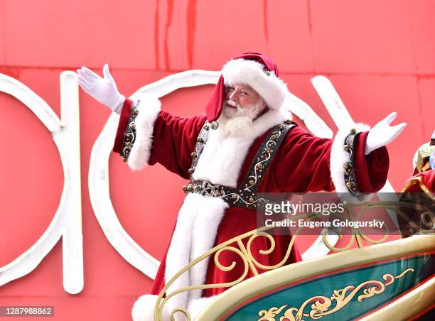Santa Claus waves from his sleigh float at the 94th Annual Macy's Thanksgiving Day Parade® on November 26, 2020 in New York City. The World-Famous...