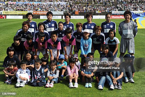 Okayama Yunogo Belle players pose for photograph prior to the Nadeshiko League match between Okayama Yunogo Belle and INAC Kobe Leonessa at Mimasaka...