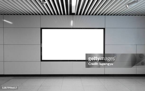 blank billboard on subway - striscione segnale foto e immagini stock