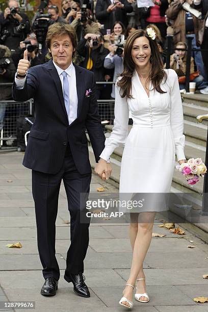 Sir Paul McCartney and his fiancee Nancy Shevell arrive at Westminster Registry Office in Marylebone for their weding on October 9, 2011 in London....