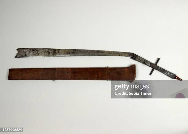 Sword with Scabbard, Dyak, 18th–19th century, Steel, wood, brass, silver, cane, L. With scabbard 28 3/4 in. ; L. Without scabbard 28 1/4 in. ; L. Of...