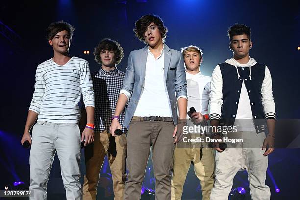 Harry Styles, Zayn Malik, Louis Tomlinson, Liam Payne and Niall Horan of One Direction perform at the BBC Teen Awards at Wembley arena on October 9,...