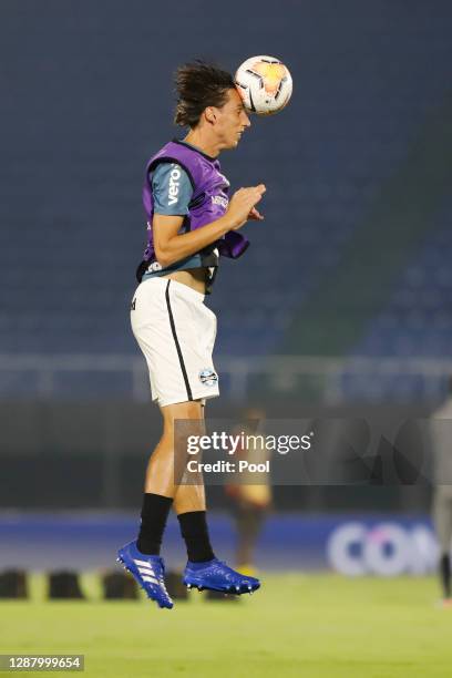 Pedro Geromel of Gremio heads the ball during warm up before a round of sixteen first leg match between Guarani and Gremio as part of Copa Conmebol...