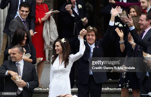 Sir Paul McCartney and Nancy Shevell attend their wedding at at Marylebone Registry Office on October 9, 2011 in London, England.