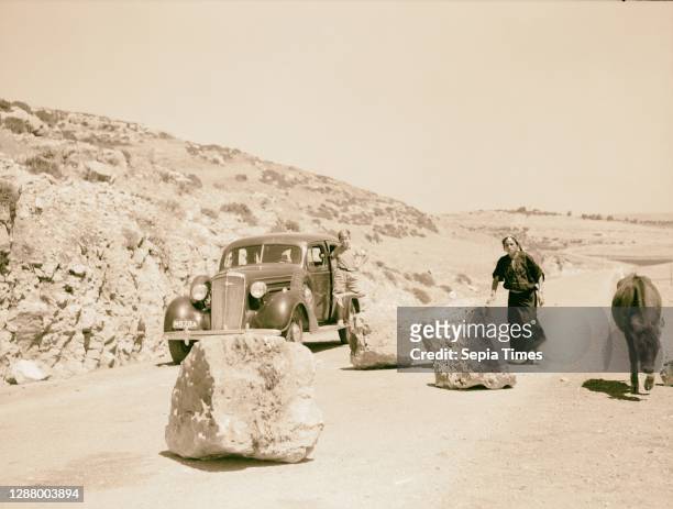 Hebron attack. Great boulders on the Hebron Highway placed by Arab gangs as a means toward wrecking police and military cars. 1938, West Bank, Hebron.