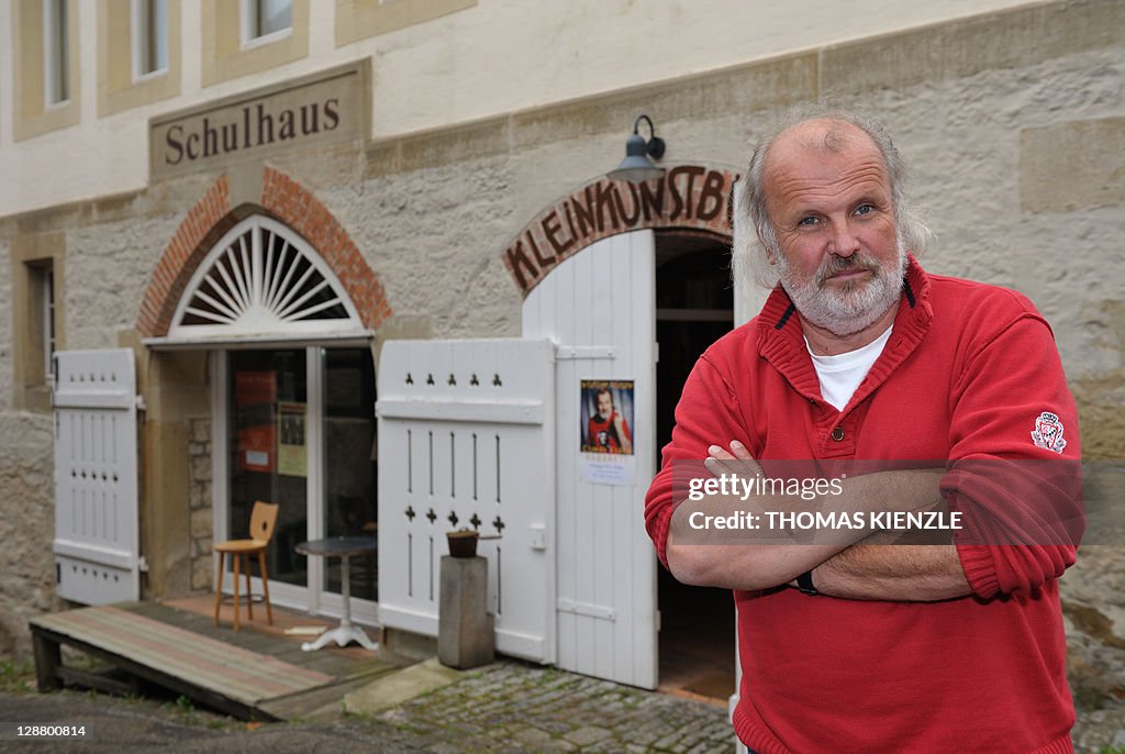 Otmar Traber, a 57-year old cabaret artist, poses in front of his ...