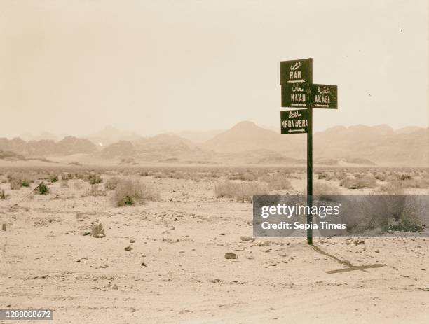 The Araba . Negeb el-Shurk. Akaba . Gulf of Akaba and el-Kuntilla. Araba. Traffic sign near Ibn Saoud boundary, indicating direction to Wadi Rum,...