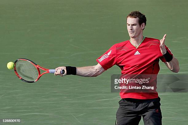 Andy Murray of Great Britain plays a forehand in his singles final during the match against Rafael Nadal of Spain during the day seven of the Rakuten...