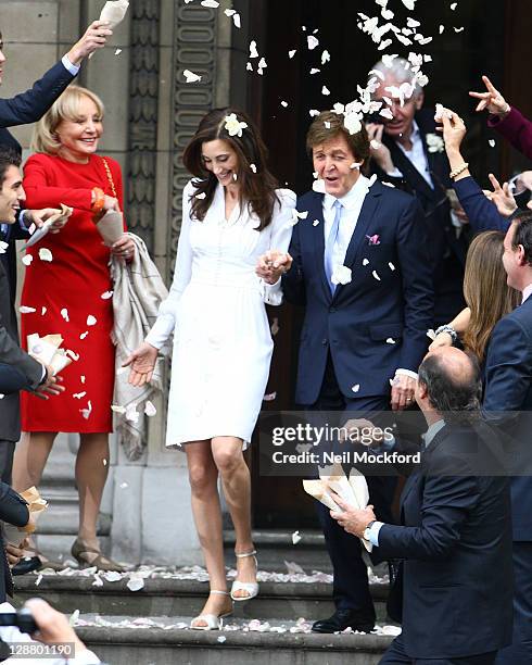 Sir Paul McCartney and Nancy Shevell seen leaving Marylebone Registry Office after their wedding on October 9, 2011 in London, England.