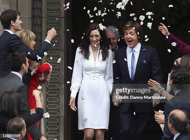 Sir Paul McCartney and Nancy Shevell after their wedding at Marylebone Registry Office on October 9, 2011 in London, England.