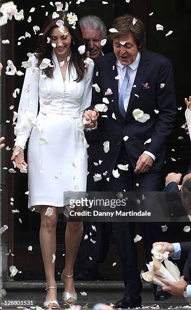 Sir Paul McCartney and Nancy Shevell after their wedding at Marylebone Registry Office on October 9, 2011 in London, England.
