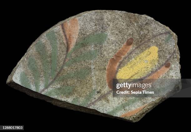 Soil fragment faience plate with polychrome flower on white ground, plate dish crockery holder soil find ceramic earthenware glaze tin glaze, hand...