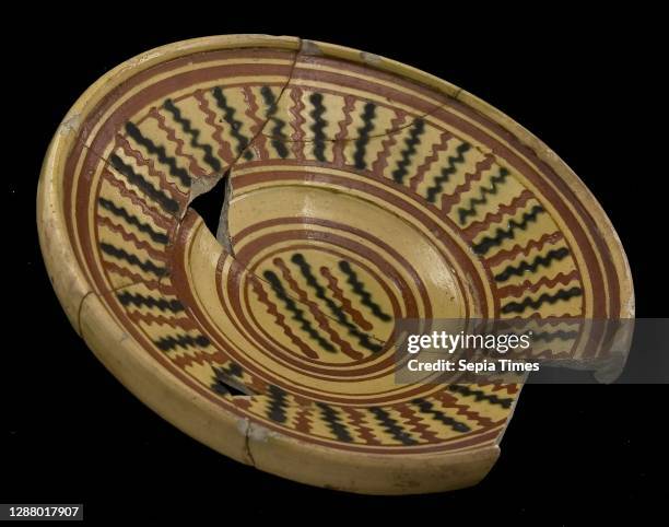 Earthenware dish on stand with red and green silt decoration, plate dish crockery holder soil find ceramic earthenware glaze lead glaze, hand turned...