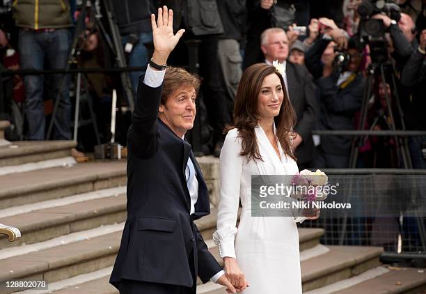 Sir Paul McCartney and Nancy Shevell arrive at the Marylebone Registry Office for their civil ceremony marriage on October 9, 2011 in London, England.