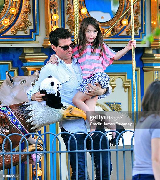 Tom Cruise and Suri Cruise visit Schenley Plaza's carousel on October 8, 2011 in Pittsburgh, Pennsylvania.