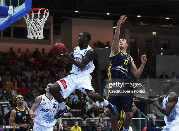 Torrell Martin of Bremerhaven scores during the Basketball Bundesliga match between Eisbaeren Bremerhaven v ALBA Berlin at Stadthalle on October 9,...