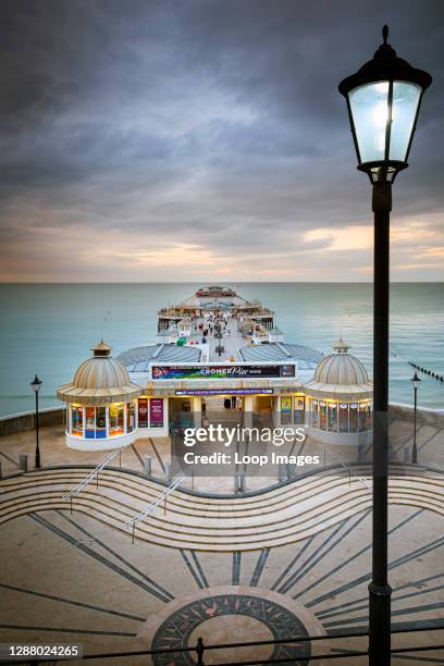 People start to arrive for the evening show in the pavilion at Cromer pier.