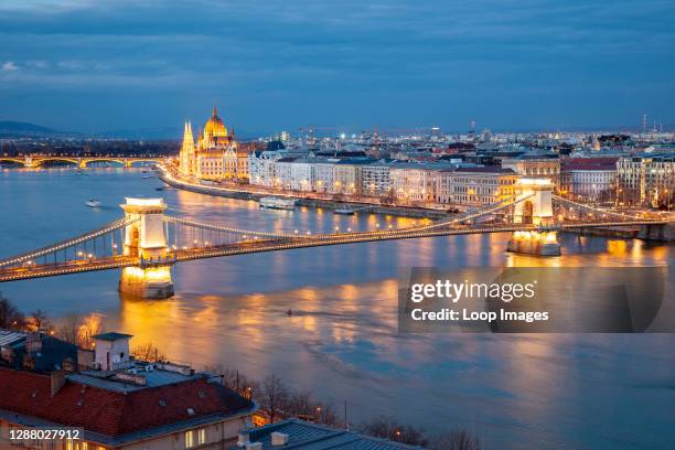 Night falls on the Danube in Budapest.