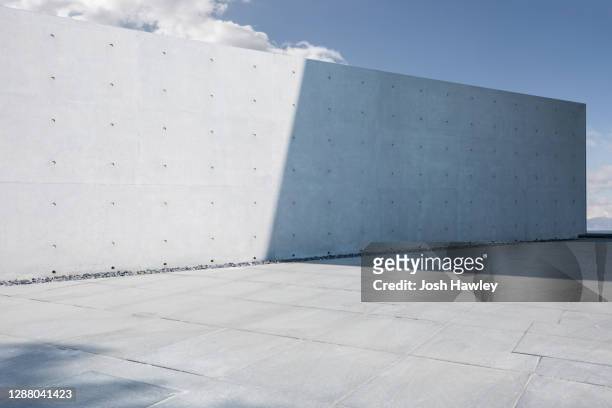concrete parking lot - wand stock-fotos und bilder