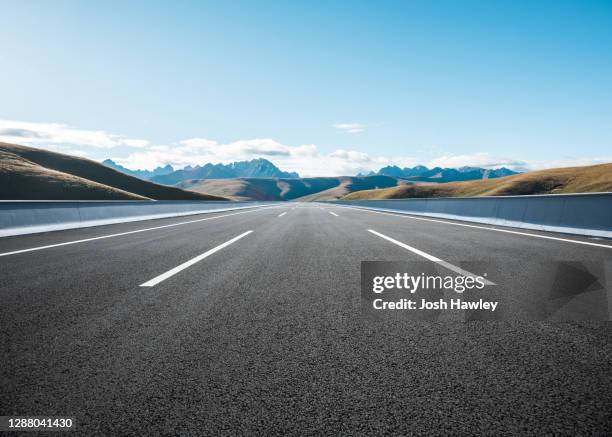 mountain road - empty road nature stock pictures, royalty-free photos & images