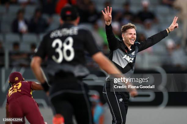 Lockie Ferguson of New Zealand celebrates a wicket during game one of the International T20 series between New Zealand and the West Indies at Eden...