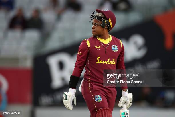 Shimron Hetmyer of the West Indies watches his wicket as he leaves the field during game one of the International T20 series between New Zealand and...